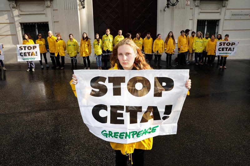 Greenpeace protest aiming to stop the Comprehensive Economic and Trade Agreement (CETA) between Canada and the EU. Activists blocked the entrance of the Federal Chancellery of the Republic of Austria to avoid the decision of Austrian Council of Ministers to ratify the free trade agreement.